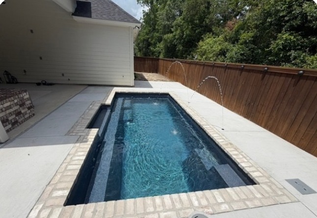 Fiberglass pool installed in Darrow, LA by Precision Pools & Outdoors
