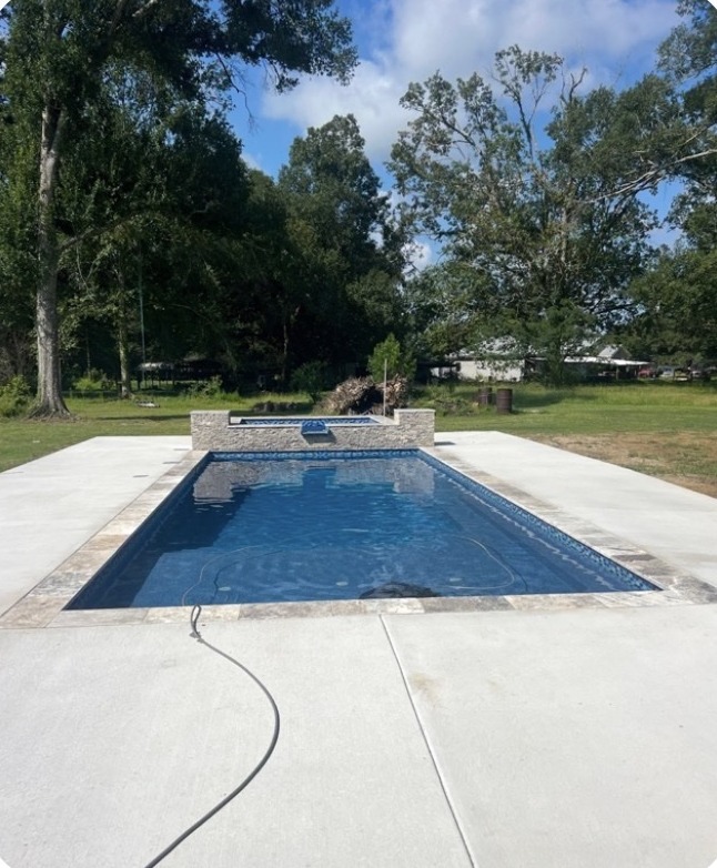 Fiberglass pool installed in St. Amant, LA by Precision Pools & Outdoors
