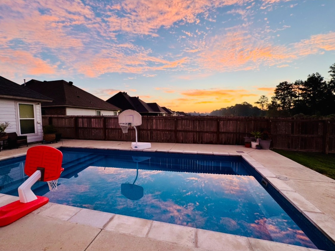 Finished Precision fiberglass pool at sunset